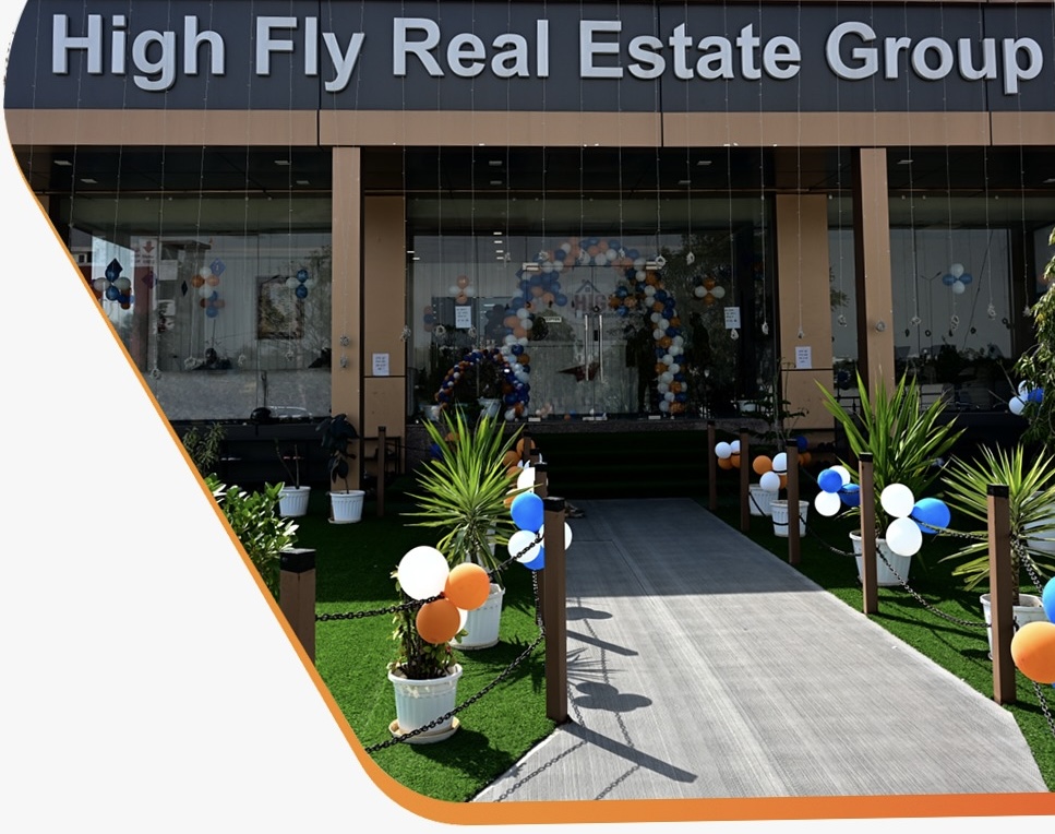 High Fly Real Estate Group logo depicting a house and bird, representing ambition and excellence in the real estate market.